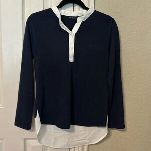 Kasu sweater with mock shirt detail.  Size not listed but small.  NWT